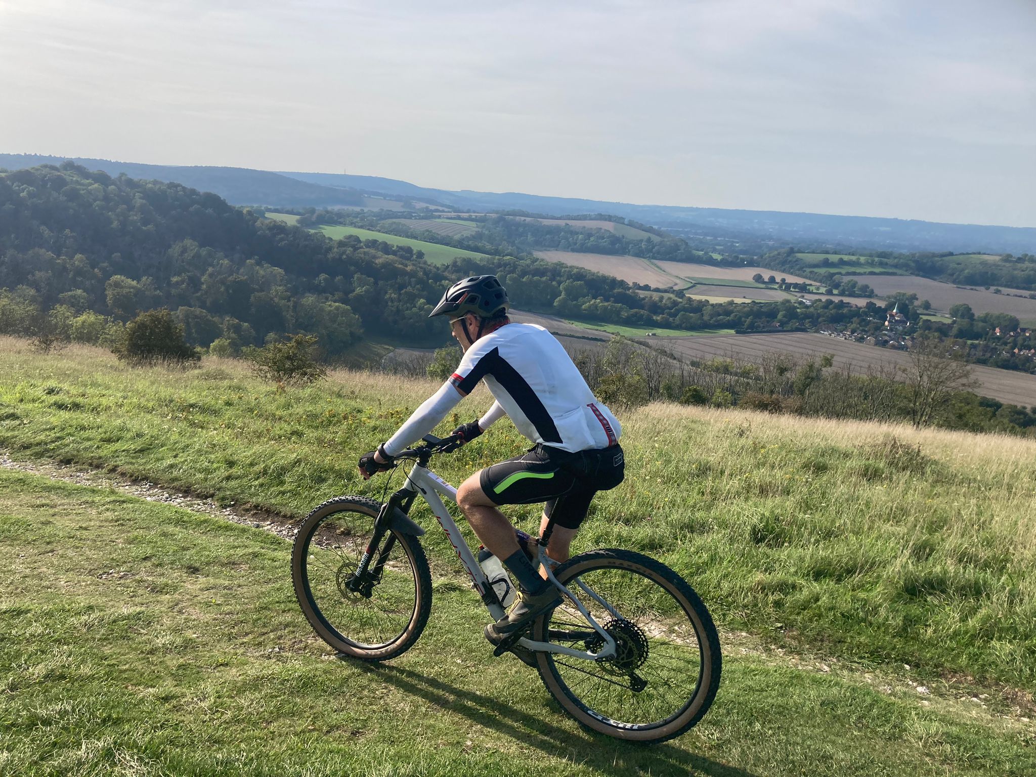 A cyclist riding the South Downs Way near South Harting